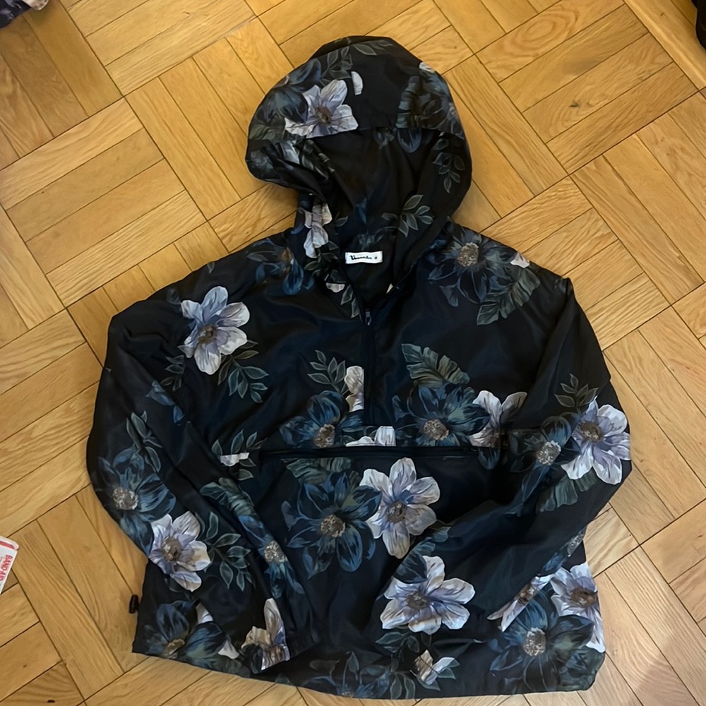 Vernacular flower hooded rain jacket
